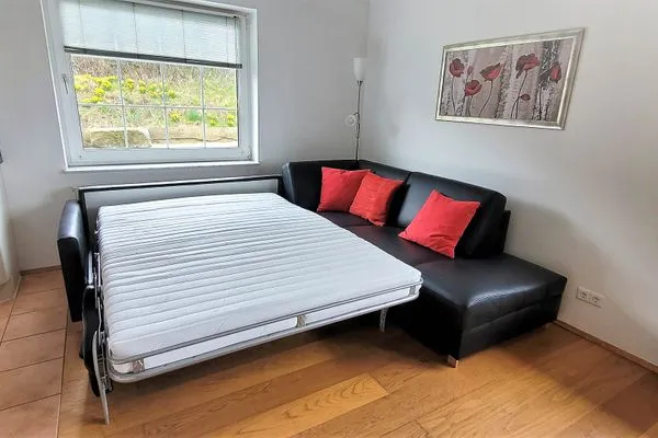 Schlafmöglichkeiten im Wohnzimmer Fuhrmannshof Ferienwohnung Cassen