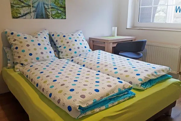 Schlafzimmer Fuhrmannshof Ferienwohnung Frauke