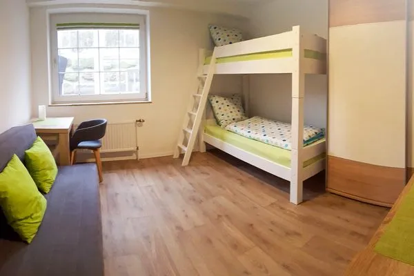 Schlafzimmer Fuhrmannshof Ferienwohnung Frauke