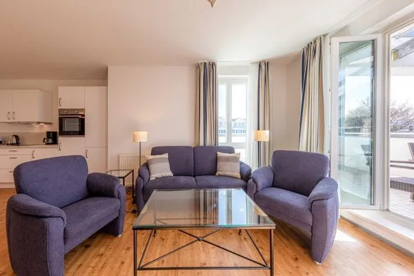Ferienwohnung Albatros Aparthotel Zingst - Wohnzimmer Sitzgruppe  Albatros