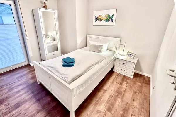 Schlafzimmer mit Einzelbett Parkresidenz am Hafen Wohnung HF 12 - "Luftsnapper´s"
