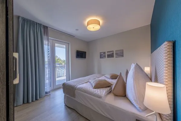 Ferienwohnung Strandblick Ostseebad Wustrow ZweiWasser Alte Seefahrtschule Schlafzimmer  Strandblick