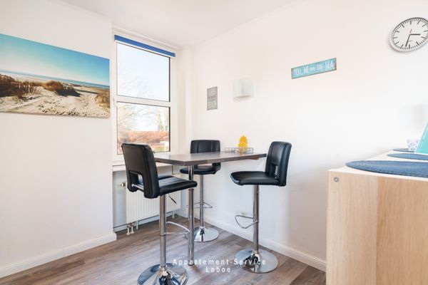  Conrad's Cove Hafenresidenz W12 A Laboe - Wohnzimmer