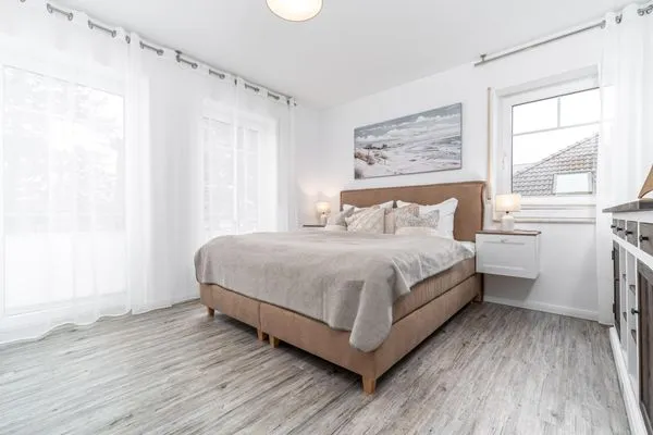 Schlafzimmer mit Doppelbett Parkresidenz am Hafen Wohnung HF 23 - "Viento"