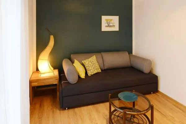 Wohnzimmer  Apartment Gartenblick 7/6 EG mit überdachter Terrasse