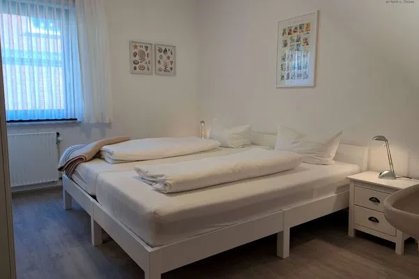 Schlafzimmer Haus Bonhuis Ferienwohnung Gartenblick