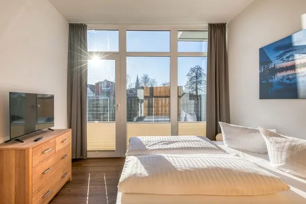 Ferienwohnung SeeNest Röbel - Schlafzimmer mit TV  SeeNest