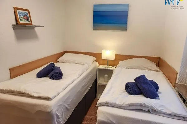 Schlafzimmer Haus Kiebitz Ferienwohnung Strandkörbchen