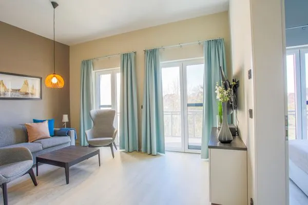 Ferienwohnung Marco Polo Ostseebad Wustrow ZweiWasser Alte Seefahrtschule Wohnzimmer  Marco Polo Suite