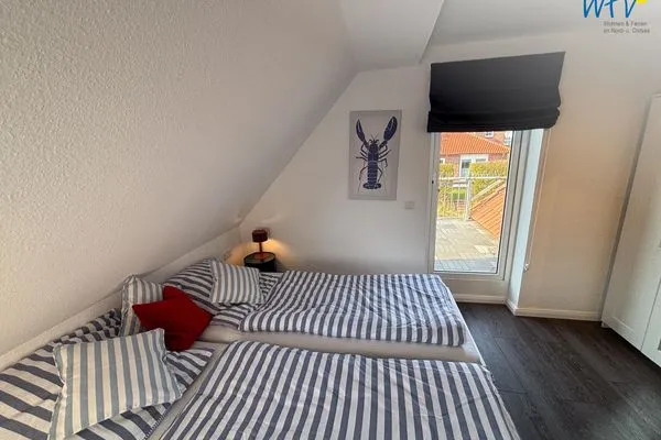 Schlafzimmer Haus Nordstern Ferienwohnung Hummerhütte