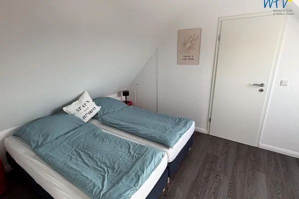 Schlafzimmer Haus Nordstern Ferienwohnung Hummerhütte