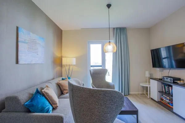 Ferienwohnung Boddenlümmel Ostseebad Wustrow - ZweiWasser Alte Seefahrtschule Wohnzimmer  Boddenlümmel