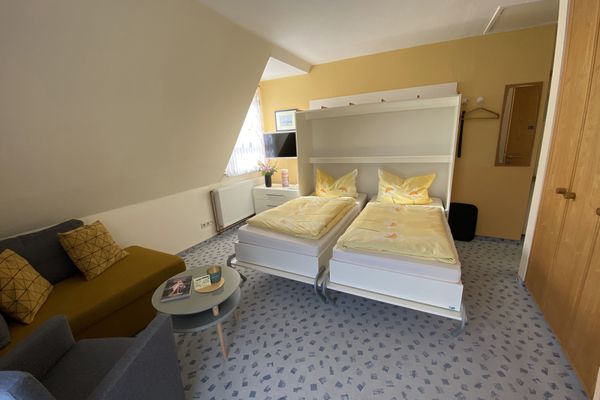  Ferienwohnung Leuchtturm Norderney - Wohnzimmer