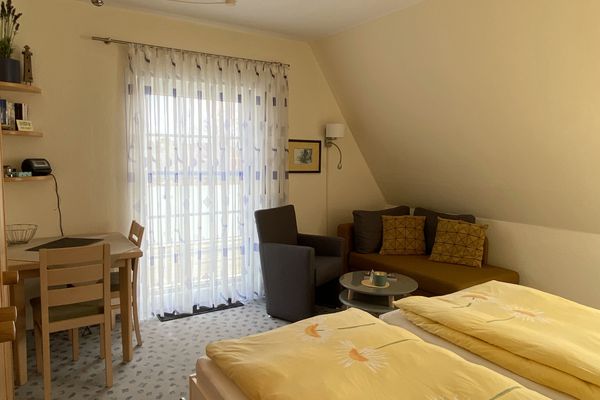  Ferienwohnung Leuchtturm Norderney - Wohnzimmer