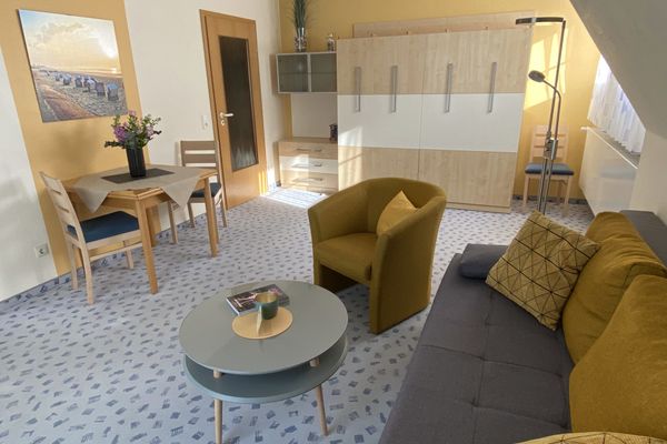  Ferienwohnung Wasserturm Norderney - Wohnzimmer