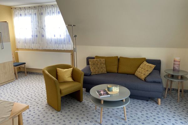  Ferienwohnung Wasserturm Norderney - Wohnzimmer