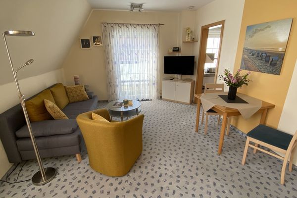  Ferienwohnung Wasserturm Norderney - Wohnzimmer