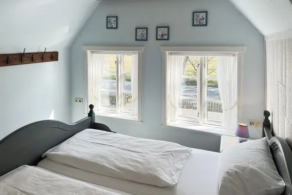 Schlafzimmer Hüs Sanskiin Ferienwohnung *Driiwholt*