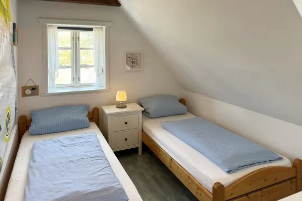 Schlafzimmer Hüs Sanskiin Ferienwohnung *Goodshenk*