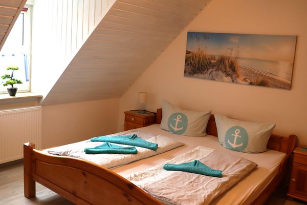  Ferienhaus DünenRose Carolinensiel - Schlafzimmer
