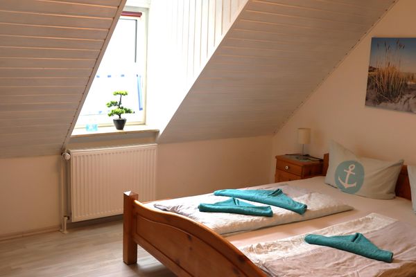  Ferienhaus DünenRose Carolinensiel - Schlafzimmer