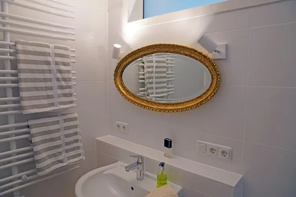 Badezimmer in der Ferienwohnung Weiße Düne 9 | Gen Norden in Wittdün auf Amrum Haus *Weiße Düne* Ferienwohnung *Weiße Düne 9 / Gen Norden*