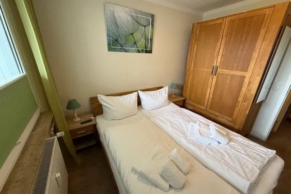 Schlafzimmer Ferienwohnung im Haus Nordland App 38