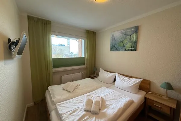 Schlafzimmer Ferienwohnung im Haus Nordland App 38
