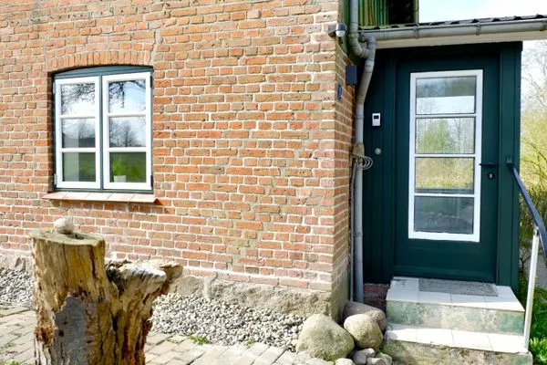 Fassade / Eingang  Ferienwohnung Hanna im Reethus Mühlenlund