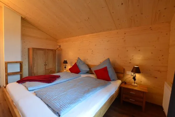 Schlafzimmer 2  Holzar Chalet - Feriendorf Via Claudia Haus 72