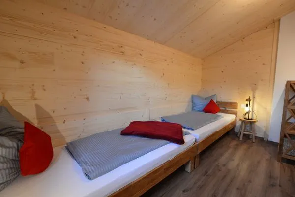 Schlafzimmer  Holzar Chalet - Feriendorf Via Claudia Haus 72