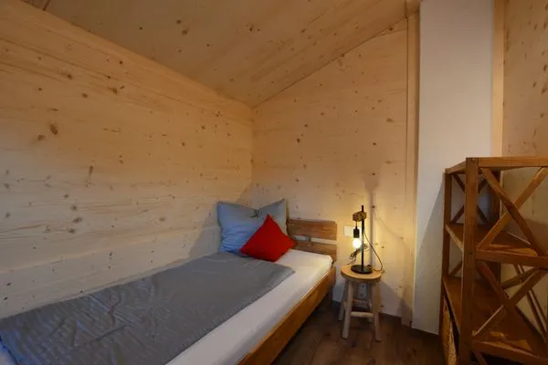 Schlafzimmer 3  Holzar Chalet - Feriendorf Via Claudia Haus 72