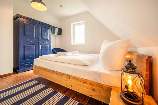 Schlafzimmer  Hus Tina