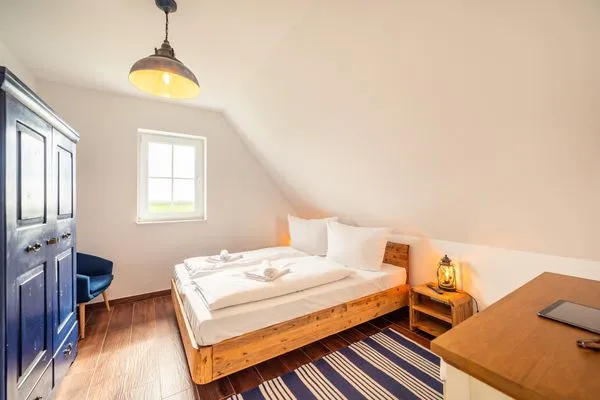 Schlafzimmer  Hus Tina