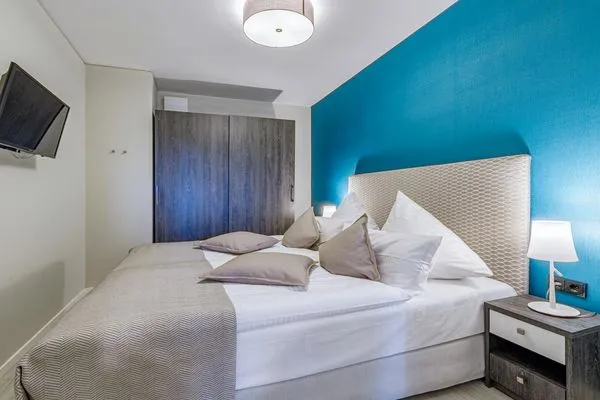 Ferienwohnung Boddenlümmel Ostseebad Wustrow - ZweiWasser Alte Seefahrtschule Schlafzimmer  Boddenlümmel