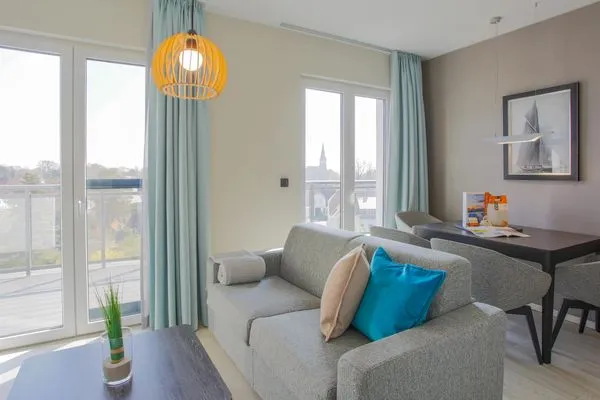 Ferienwohnung Sommerzeit Ostseebad Wustrow ZweiWasser Alte Seefahrtschule Heller Wohnbereich  Sommerzeit