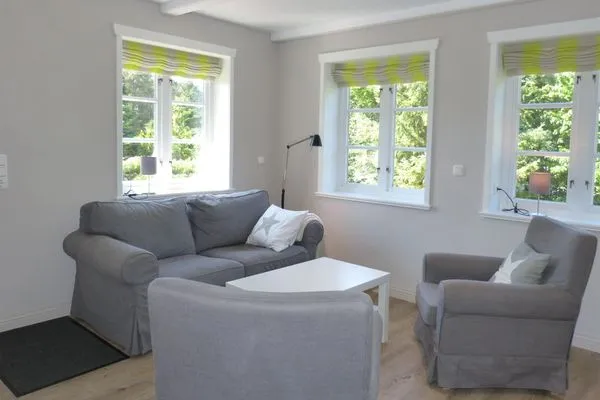 Wohnzimmer im Ferienhaus Backbord in Süddorf auf Amrum Haus *Strandweg 8* Friesenhaushälfte *Backbord*