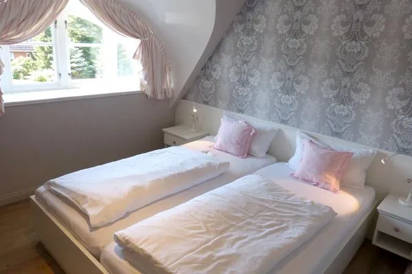 Schlafzimmer 3 im Ferienhaus Backbord in Süddorf auf Amrum Haus *Strandweg 8* Friesenhaushälfte *Backbord*