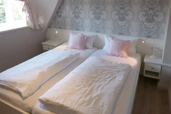 Schlafzimmer 3 im Ferienhaus Backbord in Süddorf auf Amrum Haus *Strandweg 8* Friesenhaushälfte *Backbord*