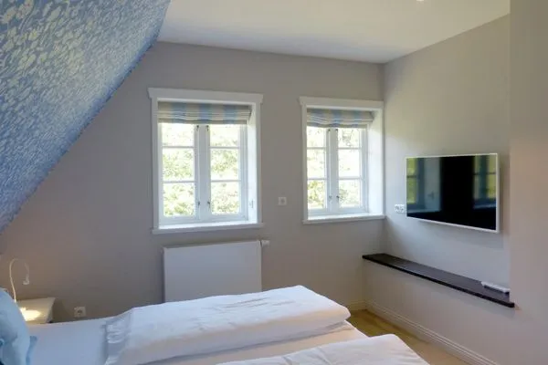 Schlafzimmer 2 im Ferienhaus Backbord in Süddorf auf Amrum Haus *Strandweg 8* Friesenhaushälfte *Backbord*