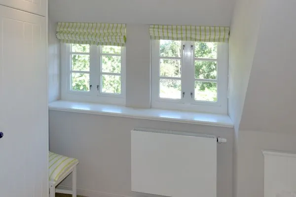 Schlafzimmer 3 im Ferienhaus Steuerbord in Süddorf auf Amrum Haus *Strandweg 8* Friesenhaushälfte *Steuerbord*