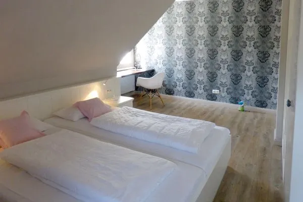Schlafzimmer 2 im Ferienhaus Steuerbord in Süddorf auf Amrum Haus *Strandweg 8* Friesenhaushälfte *Steuerbord*