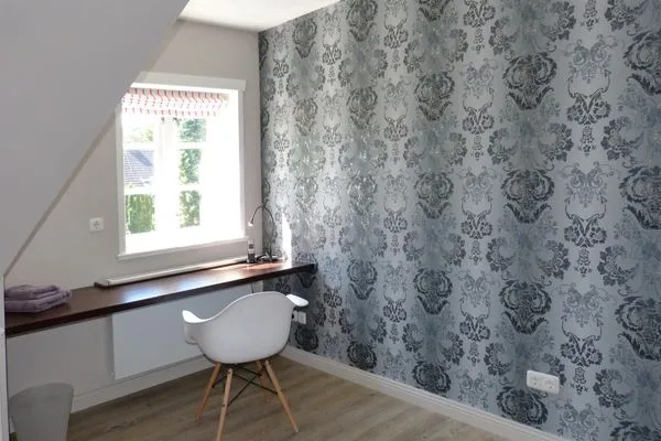 Schlafzimmer 2 mit Arbeitsplatz im Ferienhaus Steuerbord in Süddorf auf Amrum Haus *Strandweg 8* Friesenhaushälfte *Steuerbord*