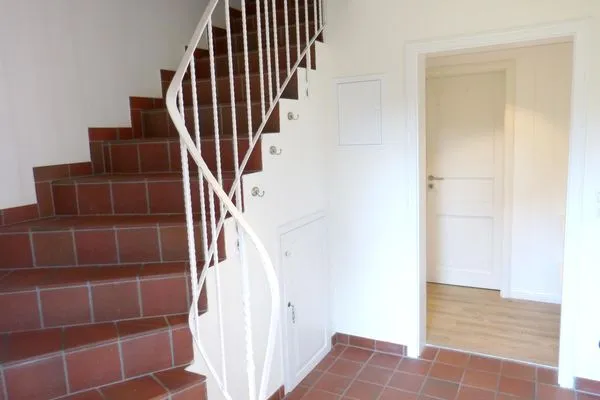 Treppenaufgang im Ferienhaus Steuerbord in Süddorf auf Amrum Haus *Strandweg 8* Friesenhaushälfte *Steuerbord*