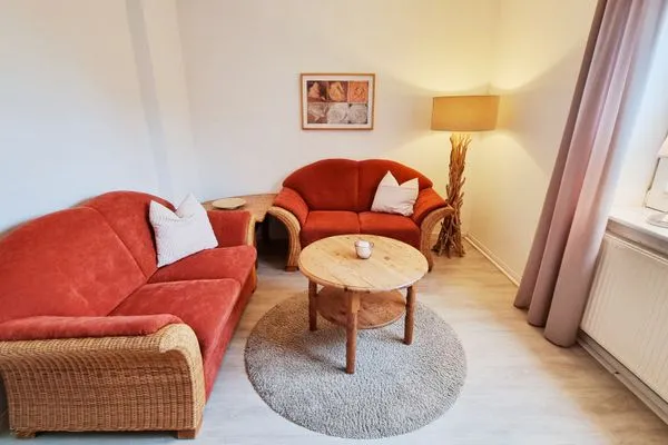 Wohnzimmer  Ferienwohnung "Achtern Diek 2" 1. Reihe an der Ostseeküste