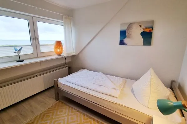 Schlafzimmer  Ferienwohnung "Achtern Diek 3" 1. Reihe an der Ostseeküste