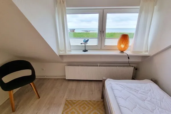 Schlafzimmer  Ferienwohnung "Achtern Diek 3" 1. Reihe an der Ostseeküste