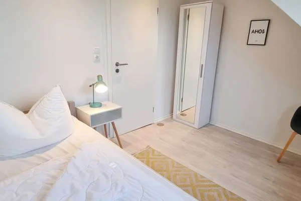 Schlafzimmer  Ferienwohnung "Achtern Diek 3" 1. Reihe an der Ostseeküste