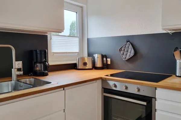 Küche / Küchenzeile  Ferienwohnung "Achtern Diek 3" 1. Reihe an der Ostseeküste