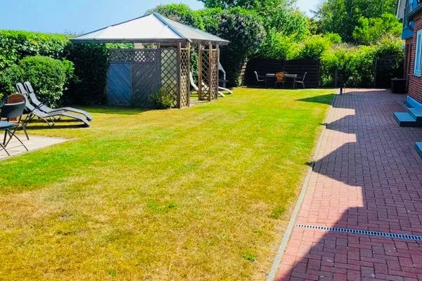 Garten  Ferienwohnung "Achtern Diek 3" 1. Reihe an der Ostseeküste